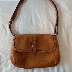 Cole Haan over the shoulder leather handbag.